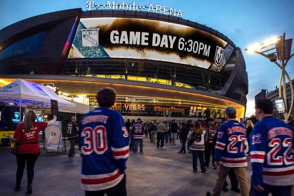 In this Jan. 7, 2018, file photo, New York Rangers fans arrive at T-Mobile Arena for an NHL hoc ...