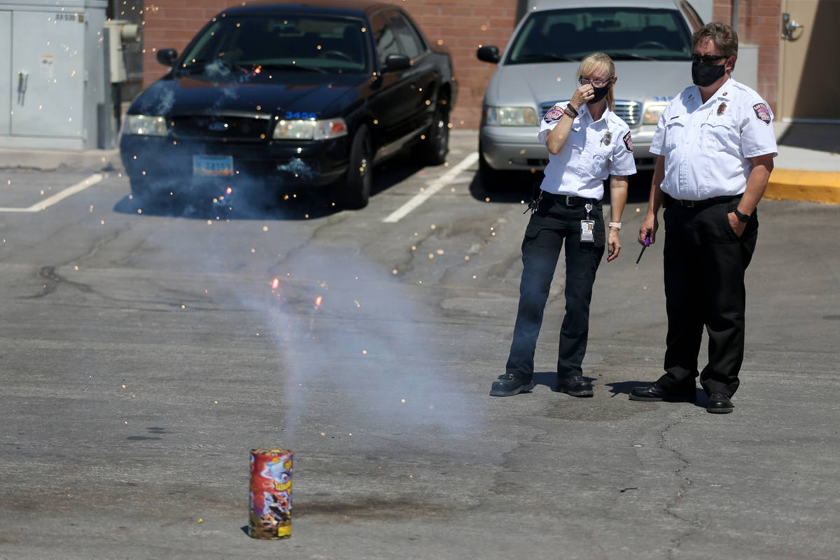 Las Vegas Fire and Rescue's fire inspector Melanie Dennon, left, and fire inspector Scott Thomp ...