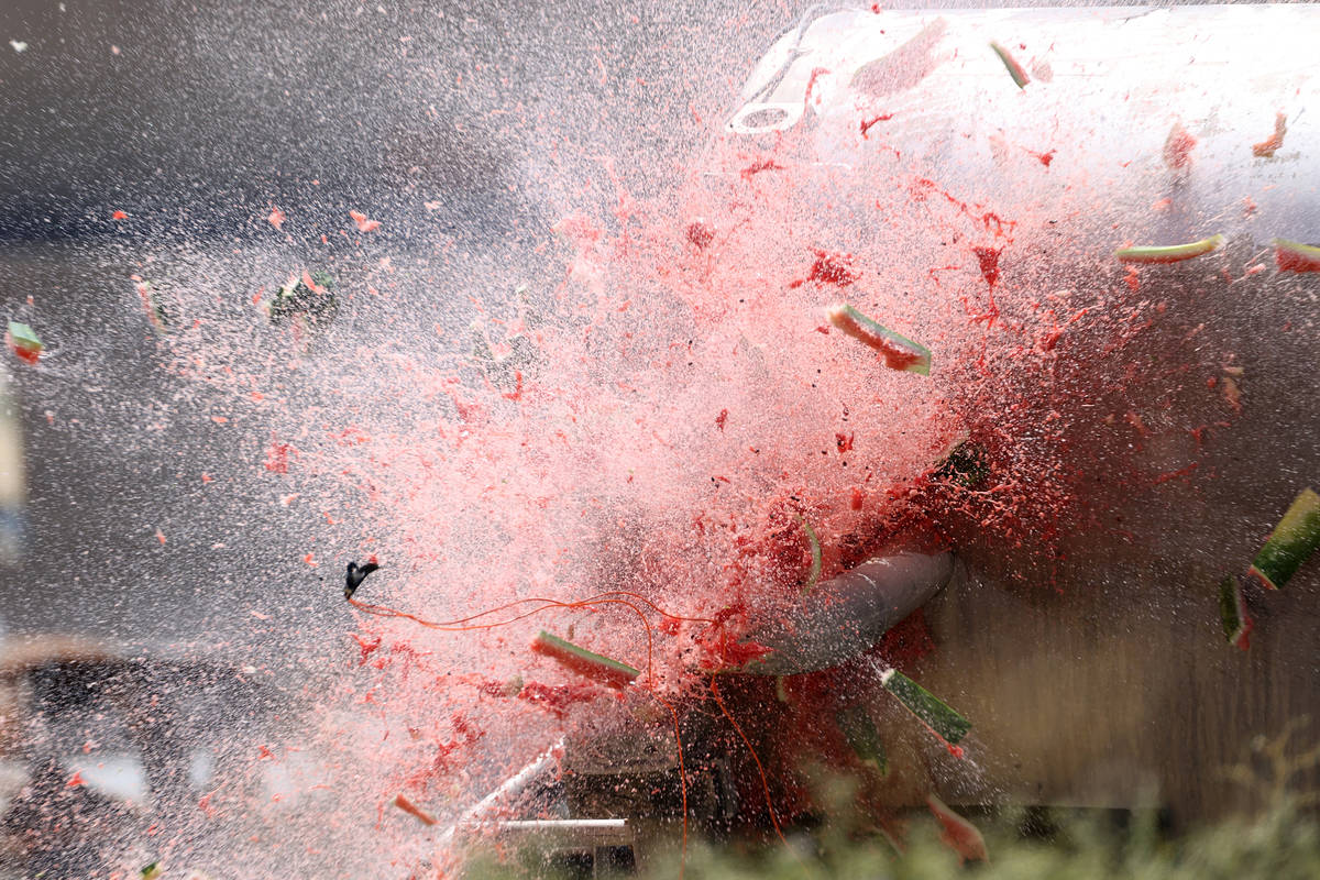 A watermelon blows off during demonstration of illegal fireworks at the Las Vegas Fire Rescue T ...