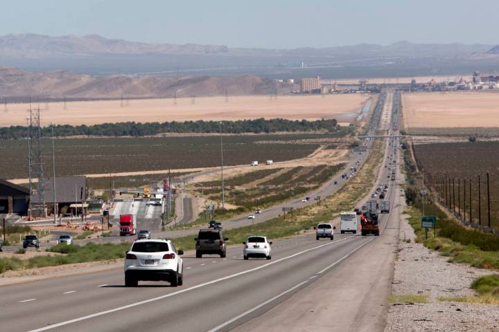 Traffic moves on Interstate 15 in California, seven miles south of Primm, near the Nipton Road ...