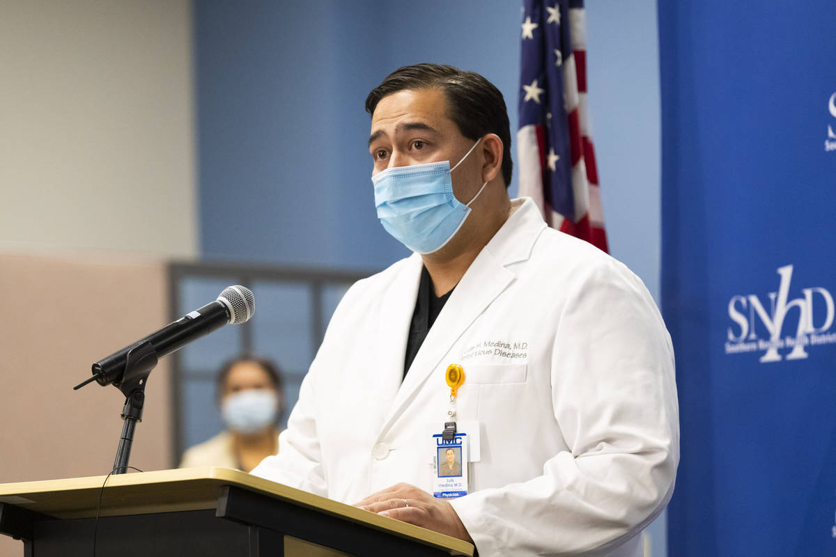 In this May 13, 2020, file photo, Dr. Luis Medina-Garcia, University Medical Center infectious ...