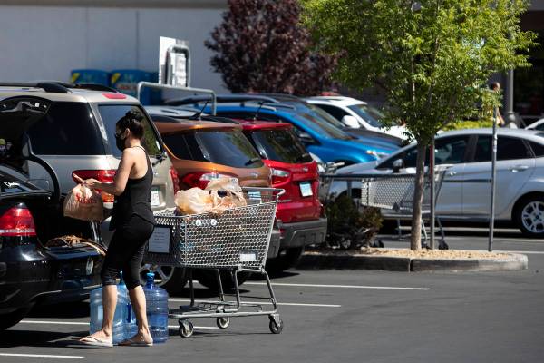 Carmen Barbasso loads her car with groceries at the Smith's Food & Drug on West Charleston ...