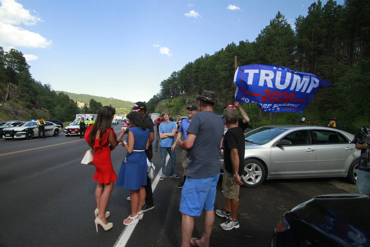 Trump supporters, some who were blocked from reaching Mount Rushmore by a blockade set up by Na ...