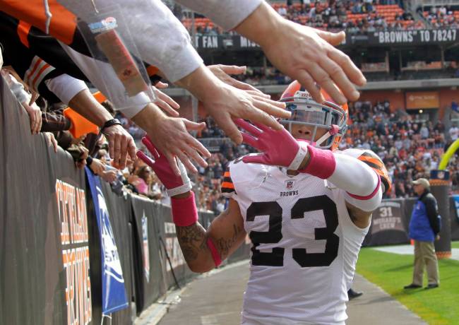 FILE - In this Oct. 23, 2011, file photo, Cleveland Browns' cornerback Joe Haden greets fans in ...
