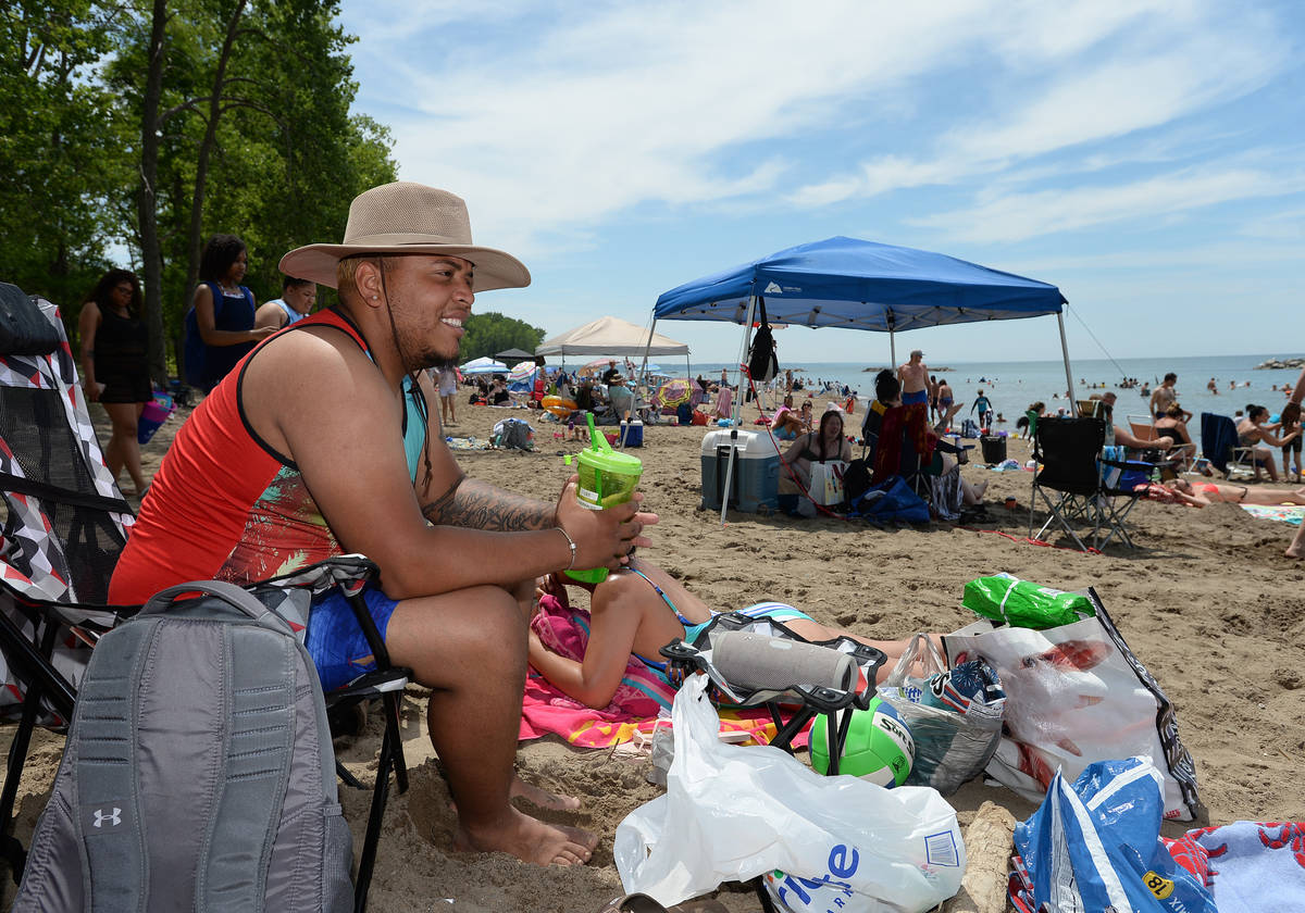 Jomar Gomez, 25, of Jamestown, N.Y., spends time for the July Fourth weekend at Beach 6, Presqu ...