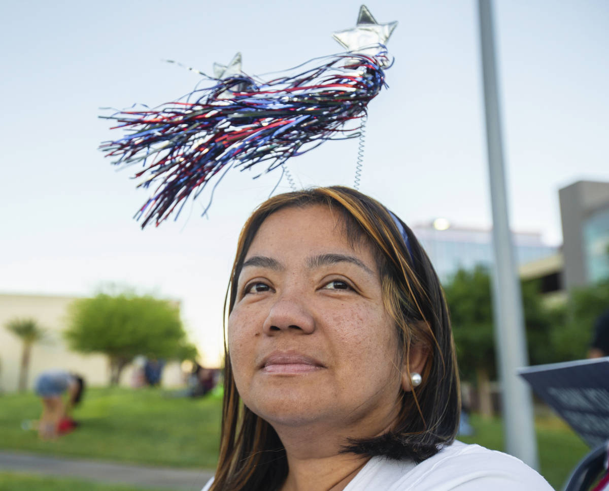Abbey Villania waits for the start of the Red Rock Casino fireworks show in Downtown Summerlin ...
