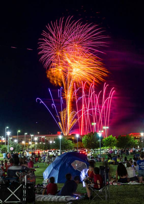 People watch the Red Rock Casino fireworks show from Downtown Summerlin on Saturday, July 4, 2 ...