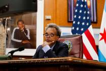 Mayor Lori Lightfoot conducts a virtual City Council meeting from her office at City Hall on We ...