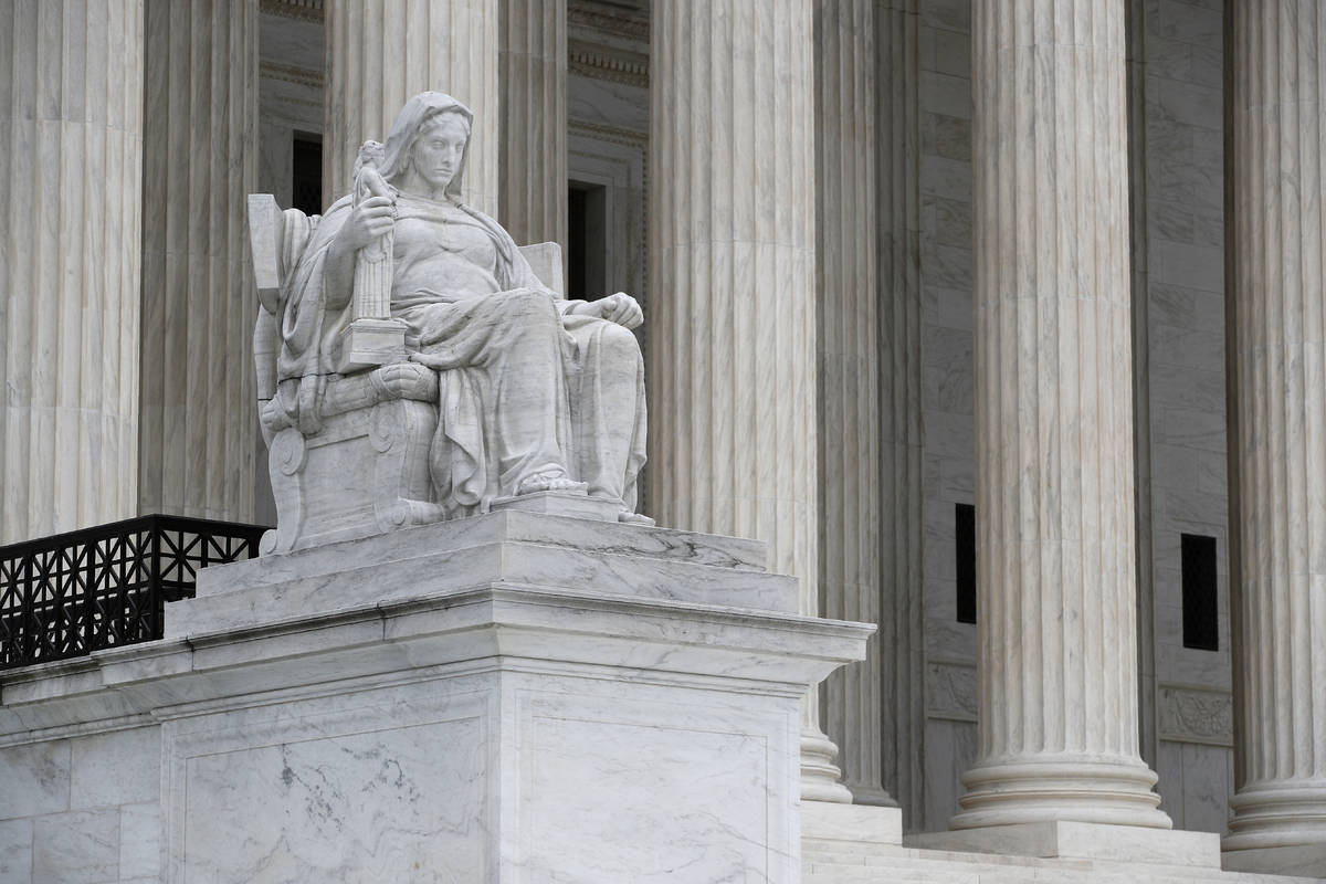 The Contemplation of Justice statue stands outside the Supreme Court on Capitol Hill in Washing ...