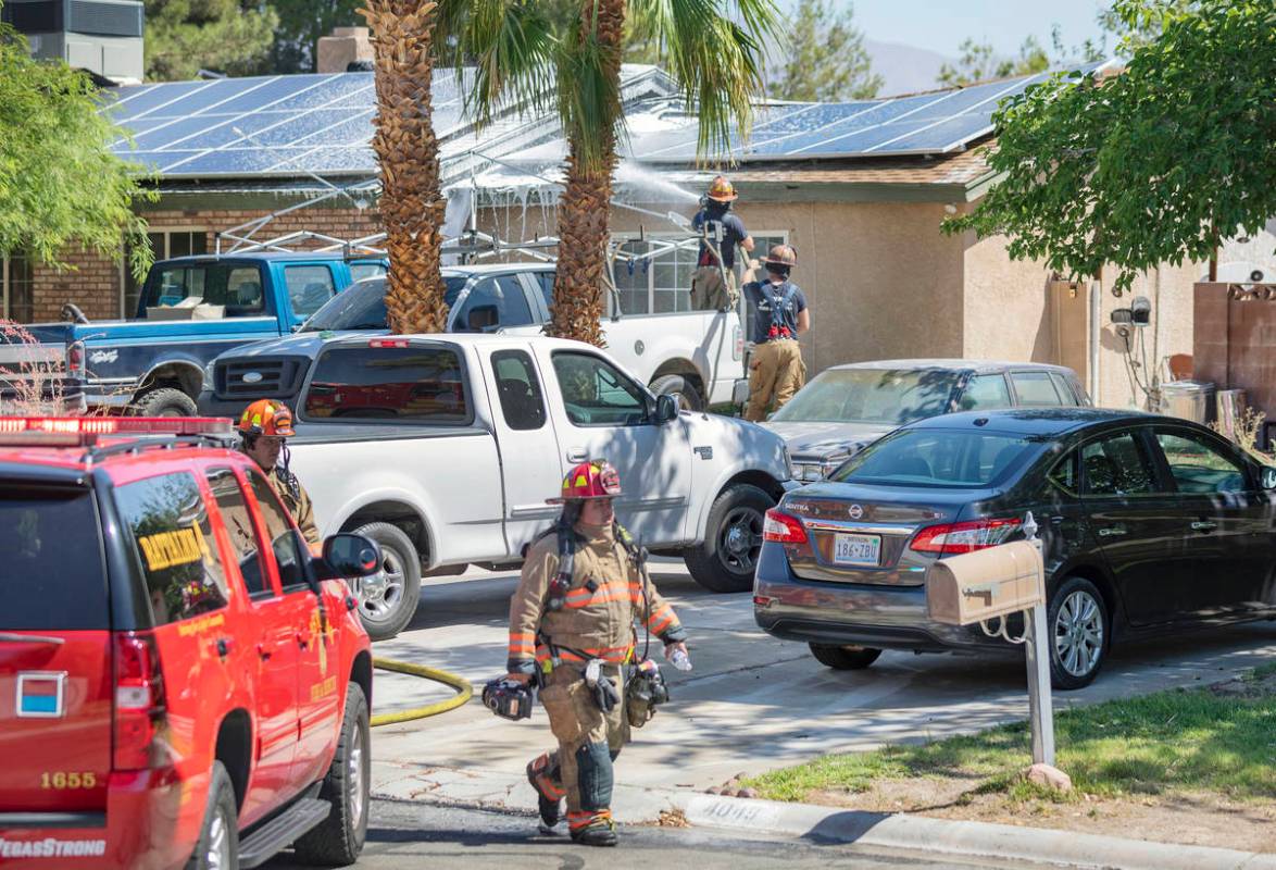 Las Vegas firefighters put out a house fire in the northwest Las Vegas Valley on the 4000 block ...