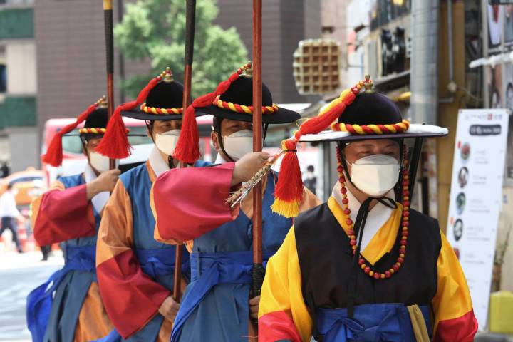 South Korean Imperial guards wearing face masks to help protect against the spread of the new c ...