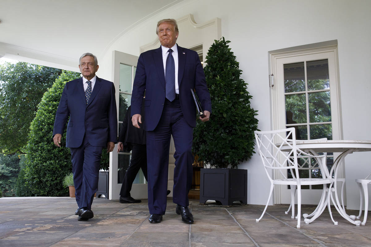 President Donald Trump and Mexican President Andres Manuel Lopez Obrador walk out of the Oval O ...