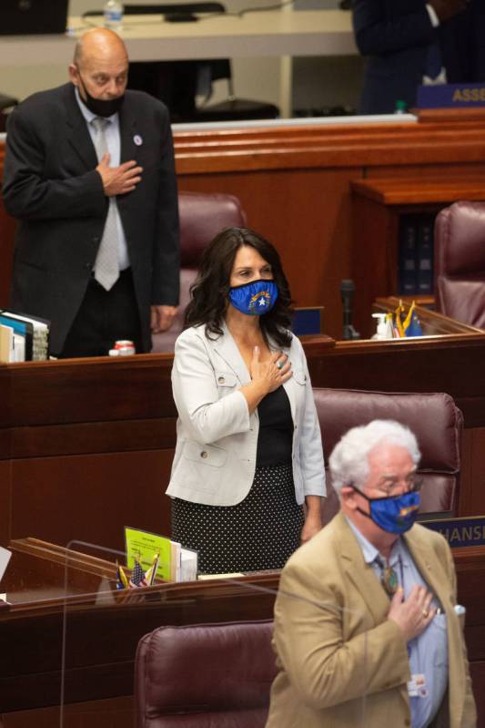 Nevada Assemblyman, Jim Wheeler, top, Alexis Hansen, middle, and John Hambrick, bottom, recite ...