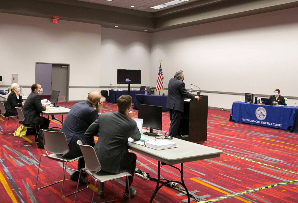 Judge Elizabeth Gonzalez, right, listens as Will Kemp, representing Planet 13 and LivFree dispe ...