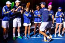 Vegas Rollers head coach Tim Blenkiron greets his team as they take the court for the second ho ...