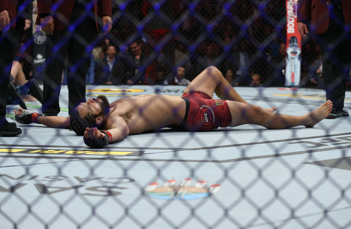 Jorge Masvidal celebrates after knocking out Ben Askre in the first round during their welterwe ...
