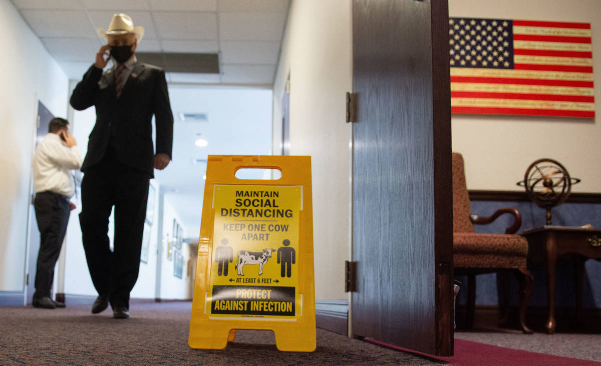 COVID-19 related safety protocol signage inside the Nevada Legislature on the second day of the ...