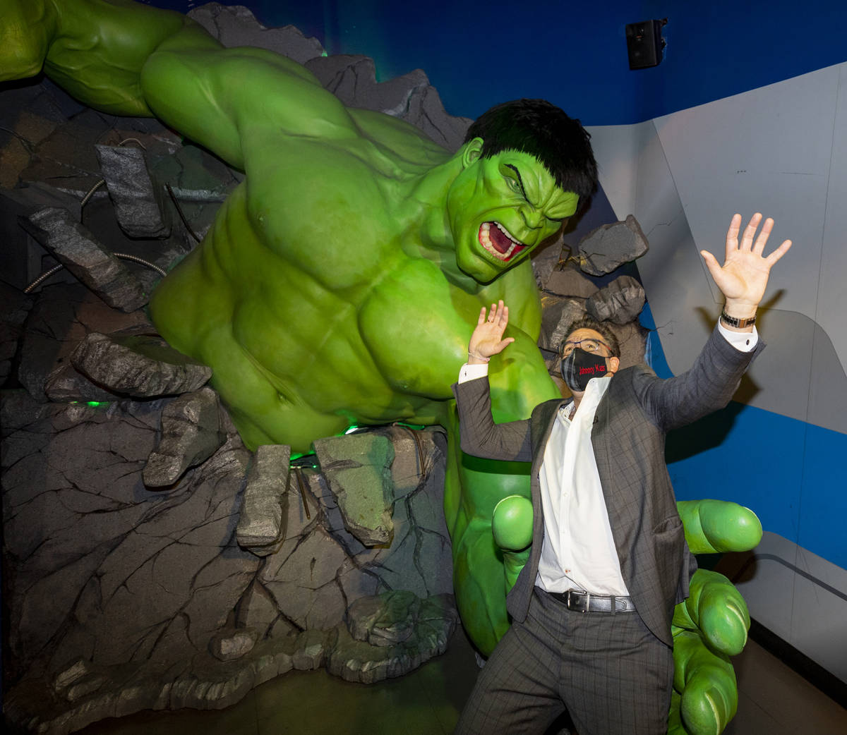 John Katsilometes poses with the Hulk during a tour of Madame Tussauds Las Vegas wax museum loc ...