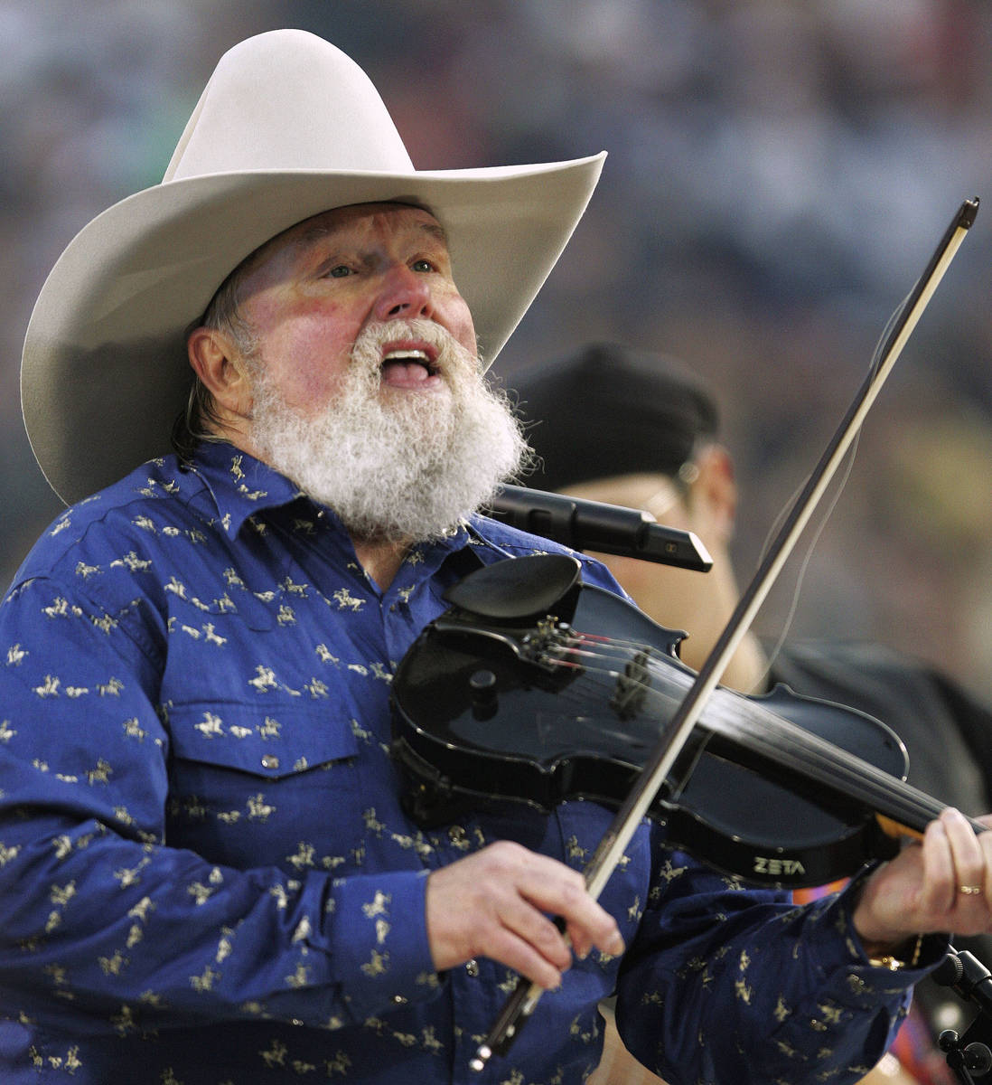 Charlie Daniels performs during pre-game festivities before Super Bowl XXXIX between the New En ...