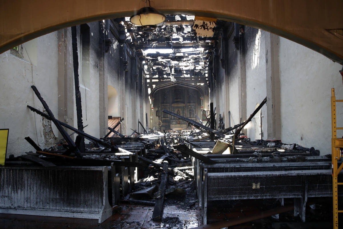 The interior of the San Gabriel Mission is damaged following a morning fire, Saturday, July 11, ...
