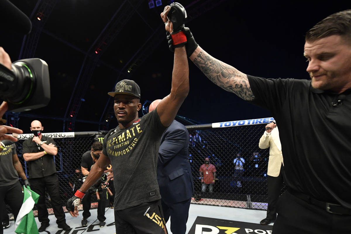 Kamaru Usman of Nigeria celebrates after his victory over Jorge Masvidal in their UFC welterwei ...