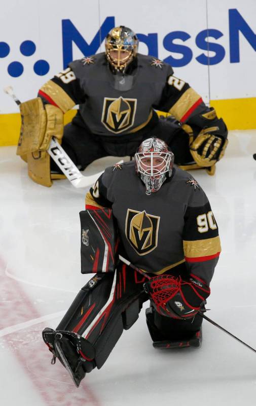 Vegas Golden Knights goaltender Robin Lehner (90) and Vegas Golden Knights goaltender Marc-Andr ...