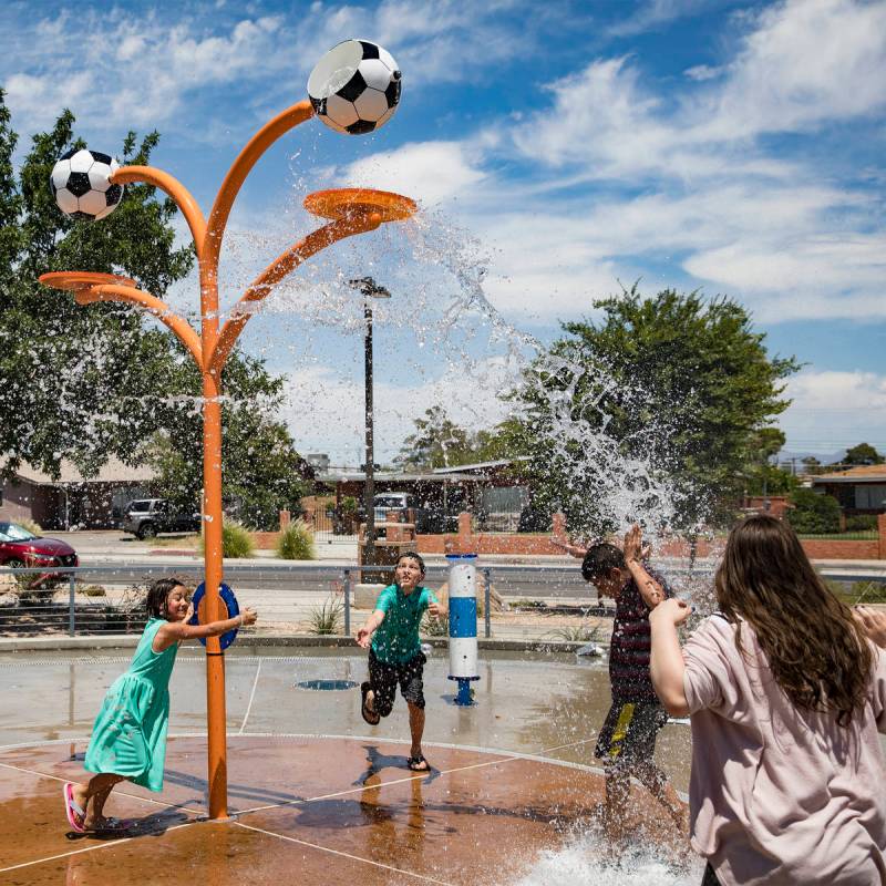 Myriah Vernoy, 8, from left, plays with her brother Josiah Vernoy, 12, center, at Baker Park in ...