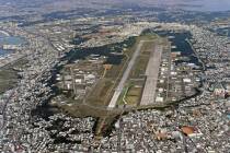 FILE - This Jan. 27, 2018, aerial file photo shows U.S. Marine Air Station Futenma in Ginowan, ...