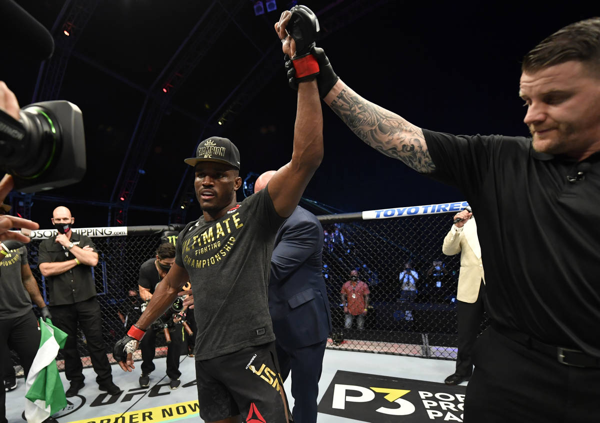 Kamaru Usman of Nigeria celebrates after his victory over Jorge Masvidal in their UFC welterwei ...