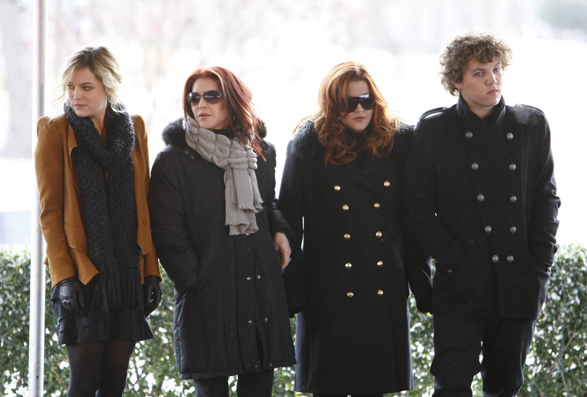 FILE - In this Jan. 8, 2010, file photo, Priscilla Presley, second from left, her daughter, Lis ...