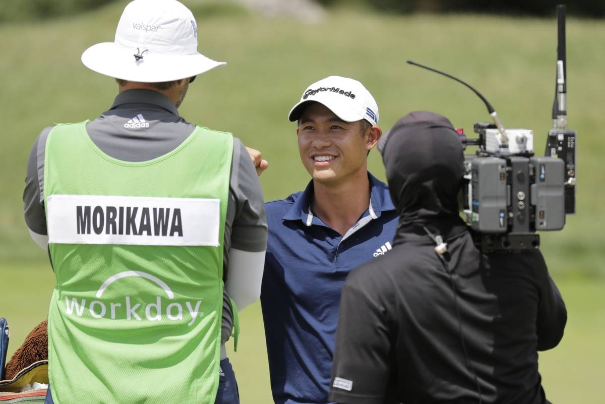 Collin Morikawa smiles after winning the Workday Charity Open golf tournament on the third play ...
