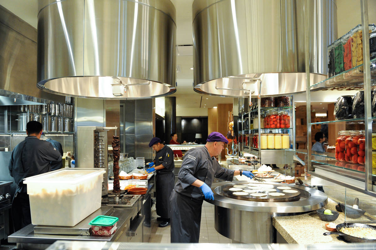 Chefs prepare food in the Mexican kitchen of the Bacchanal Buffet at Caesars Palace, 3570 Las V ...