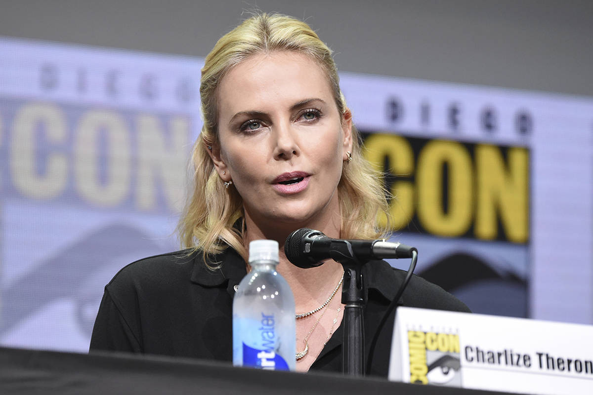 Charlize Theron speaks at the "Women Who Kick Ass" panel on day three of Comic-Con In ...