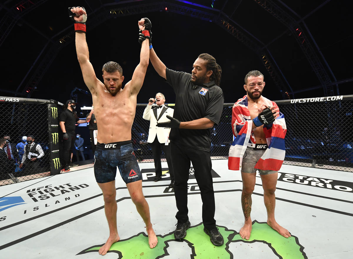 Calvin Kattar celebrates after his decision victory over Dan Ige in their featherweight fight d ...