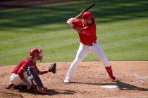 Los Angeles Angels center fielder Mike Trout bats during an intrasquad game at baseball practic ...