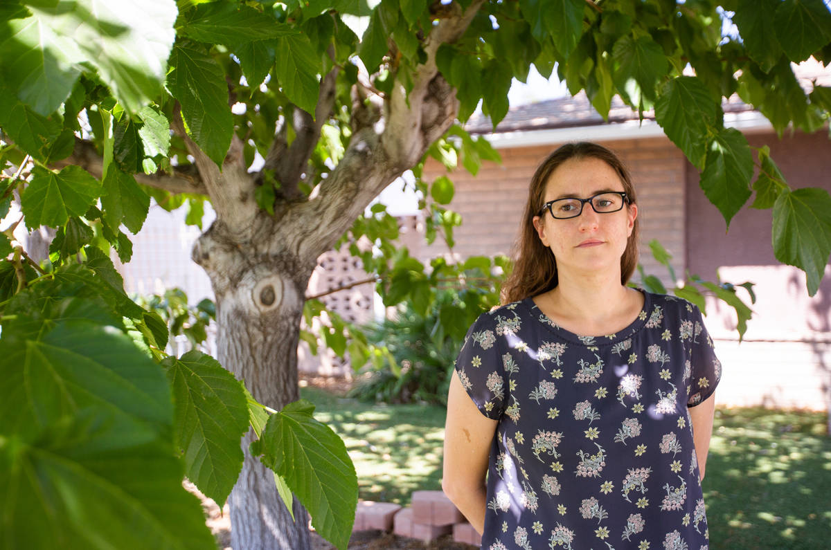 Lisa Hack, the business manager for the Nevada Broadcasters Association, stands outside her hom ...