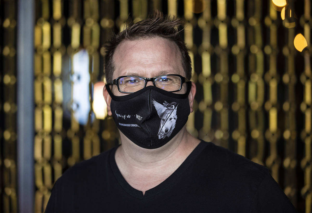 Chef/owner Brian Howard wears a custom face mask at Sparrow + Wolf on Tuesday, July 14, 2020, i ...