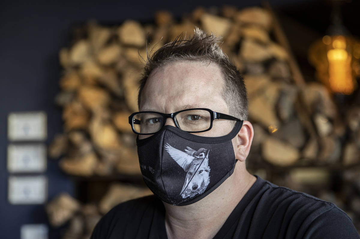 Chef/owner Brian Howard wears a custom face mask at Sparrow + Wolf on Tuesday, July 14, 2020, i ...