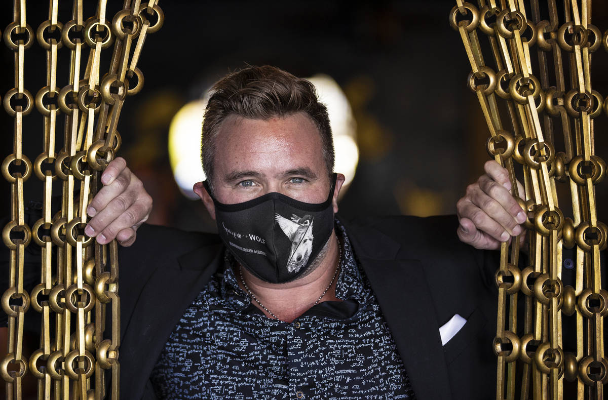 Business partner John Anthony wears a custom face mask at Sparrow + Wolf on Tuesday, July 14, 2 ...