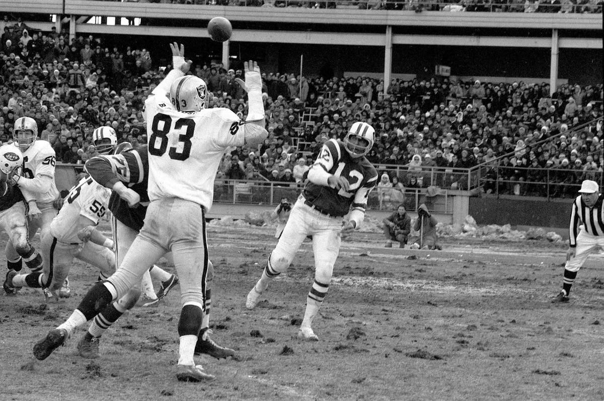 New York Jets quarterback Joe Namath gets a pass off in the first quater of the AFL championshi ...
