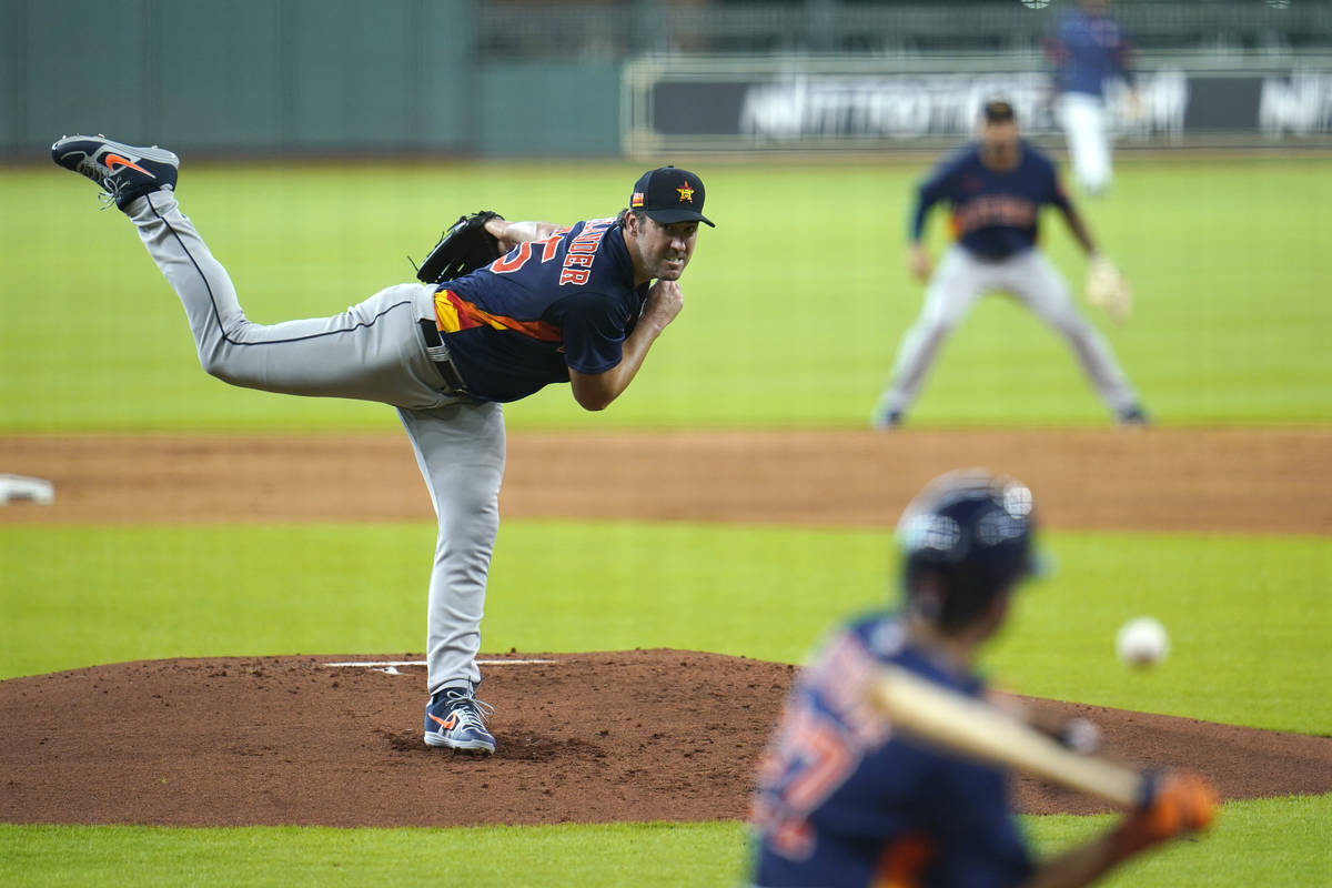 Houston Astros starting pitcher Justin Verlander throws during a simulated baseball game Thursd ...