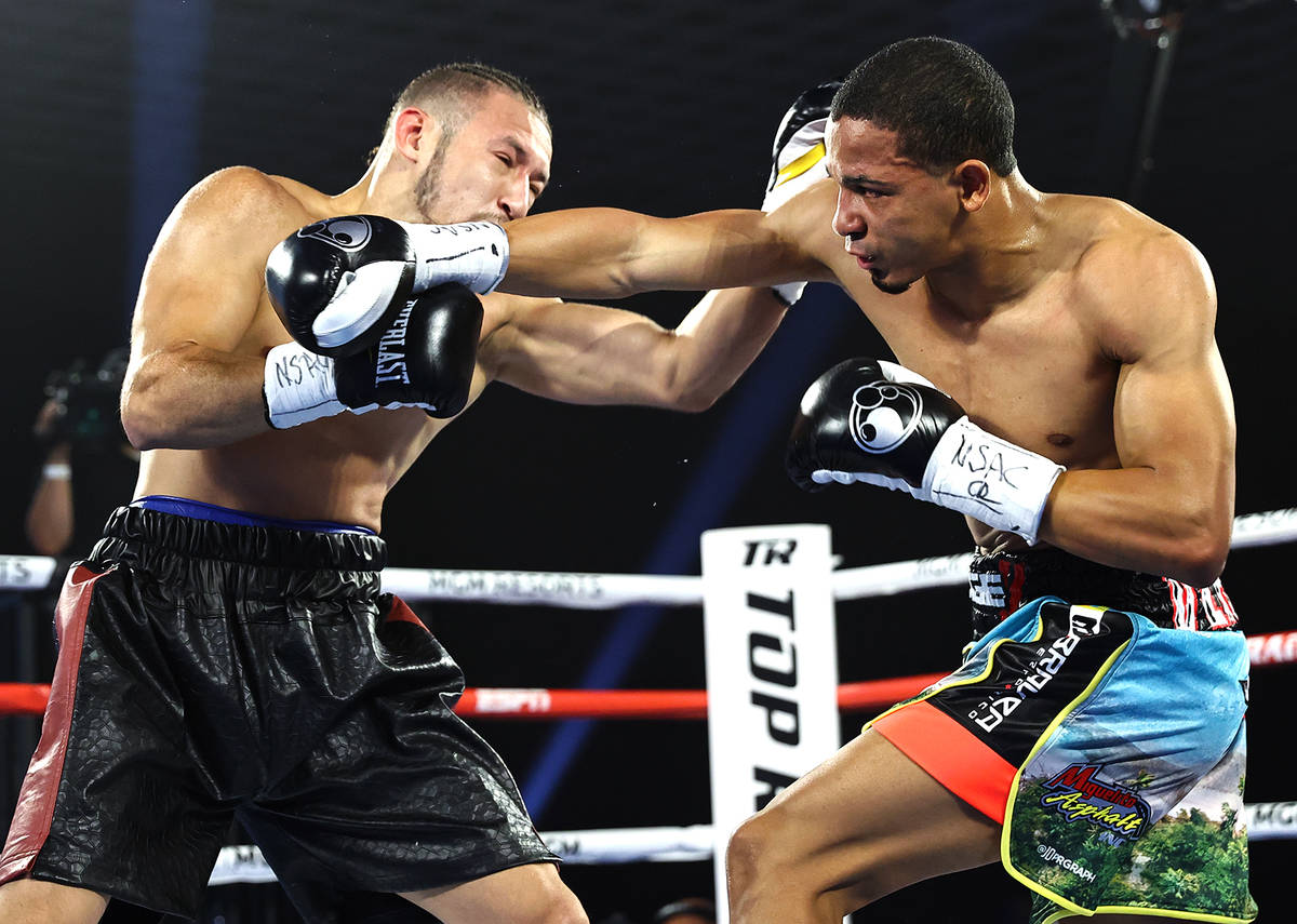 Will Madera, left, and Felix Verdejo exchange punches during their lightweight fight on Top Ran ...