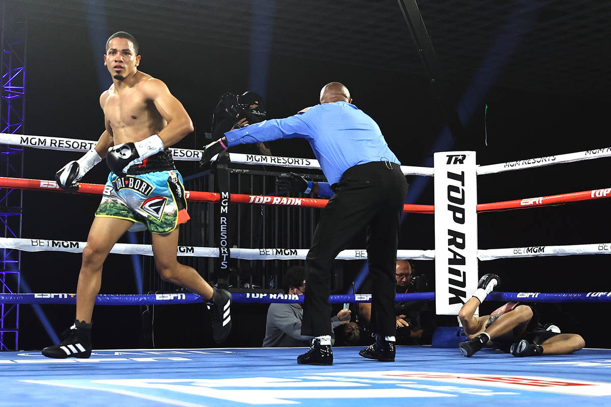 Felix Verdejo heads to his corner after knocking out Will Madera in the first round of their li ...