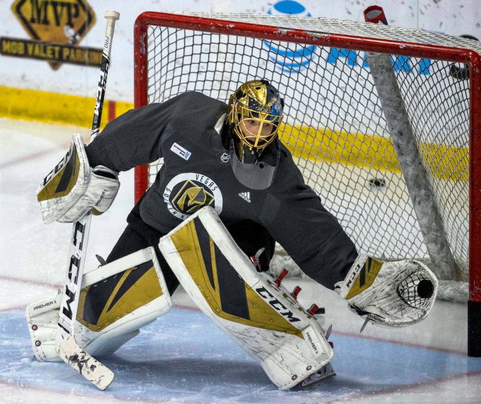 Vegas Golden Knights goaltender Marc-Andre Fleury (29) extends for a puck stop during practice ...