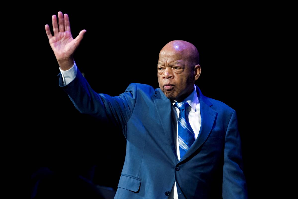 Rep. John Lewis, D-Ga., waves to the audience during swearing-in ceremony of Congressional Blac ...