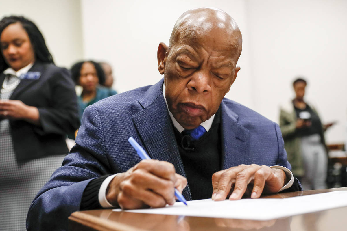 Congressman John Lewis signs paperwork to qualify for reelection to his District 5 seat in Atla ...