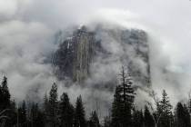 FILE - In this Feb. 20, 2019, file photo, fog covers the El Capitan landmark in Yosemite Nation ...
