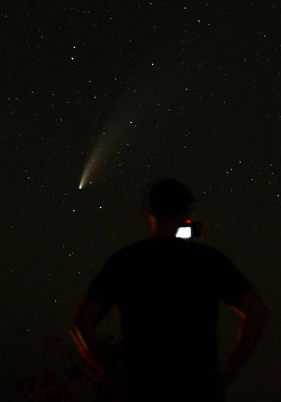 David Ray of Las Vegas makes a long exposure image of the NEOWISE comet on Saturday, July 18, 2 ...