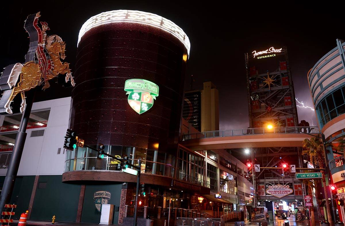 Lightening flashes over the Fremont Street Experience in downtown Las Vegas on Monday, July 20, ...