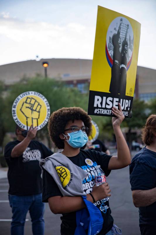 Na'Kiya Lloyd, 15, listens to a speaker at a rally in support of Black Lives Matter hosted by t ...